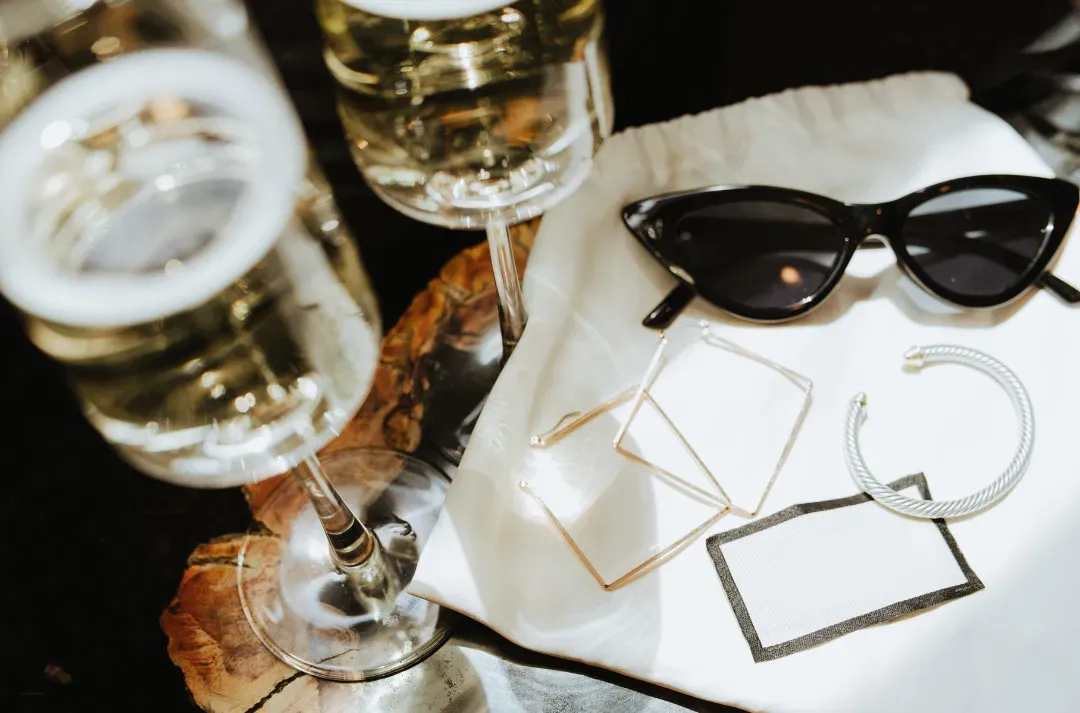 Lifestyle accessories on a table representing elevated confidence